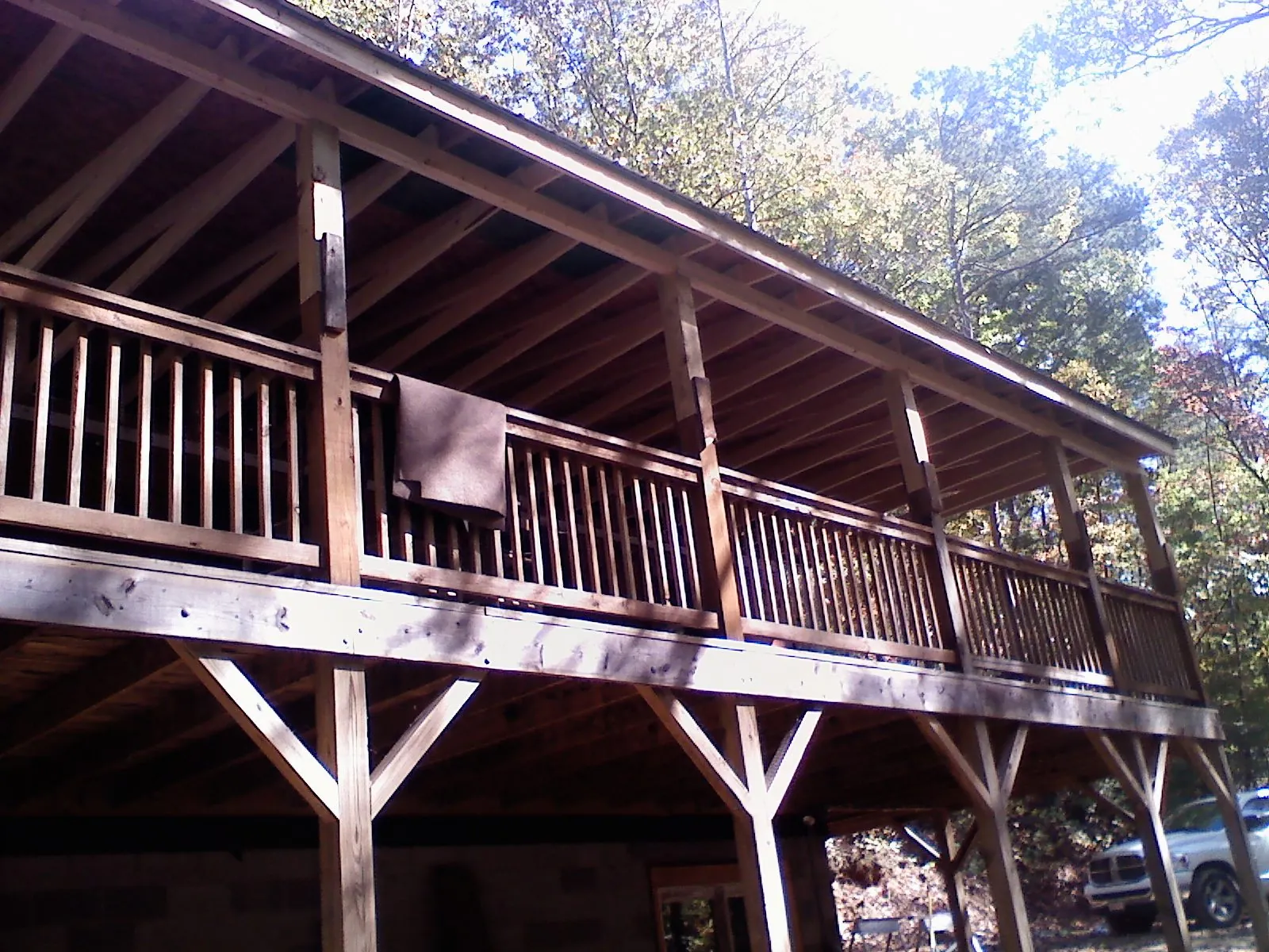 Timber framing under a new elevated porch and deck — Roof Leak Repair in Macy by Roofing Brothers